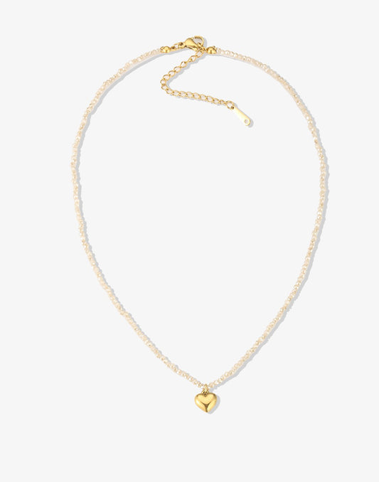 kralenketting hartje beige
