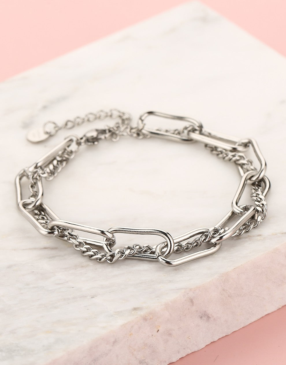 double silver-colored link bracelet