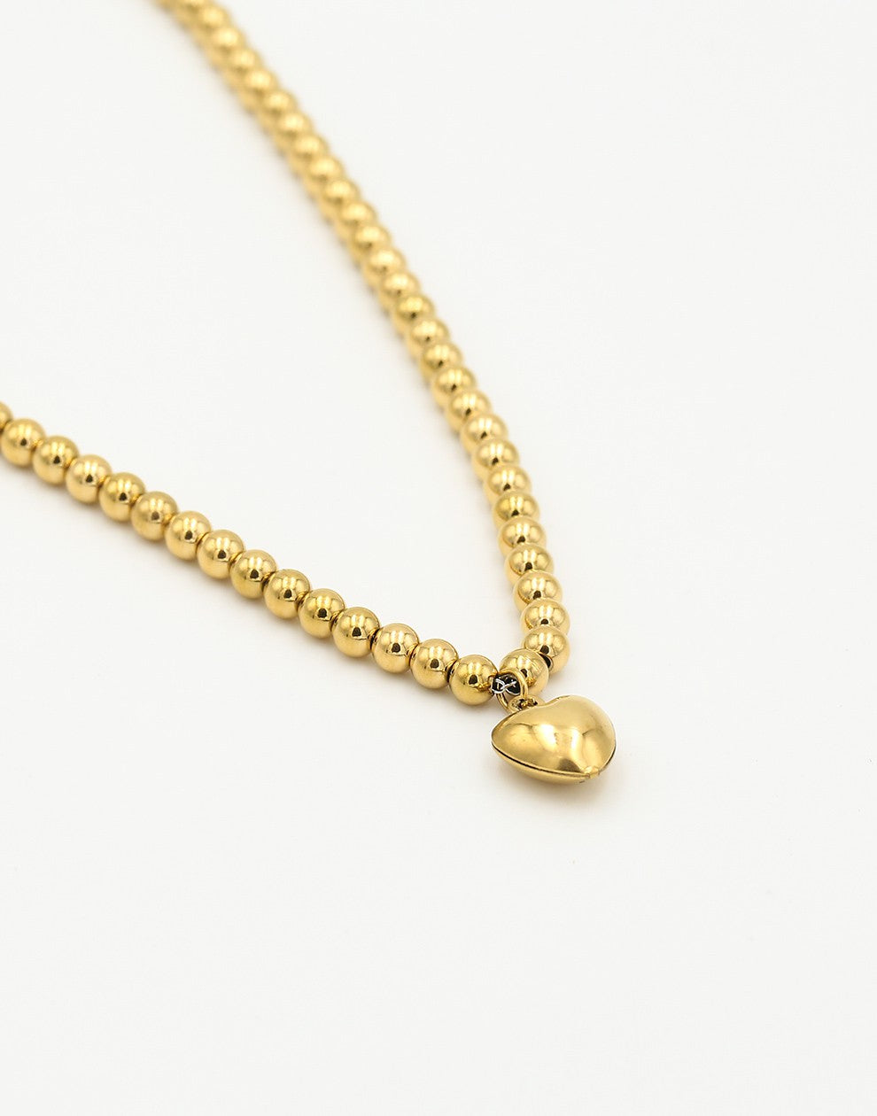 bolletjes ketting met hart goudkleurig