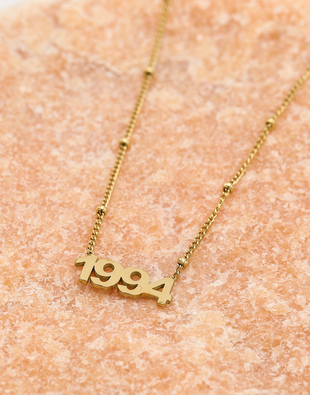 Ketting jaartal 1994 goudkleurig
