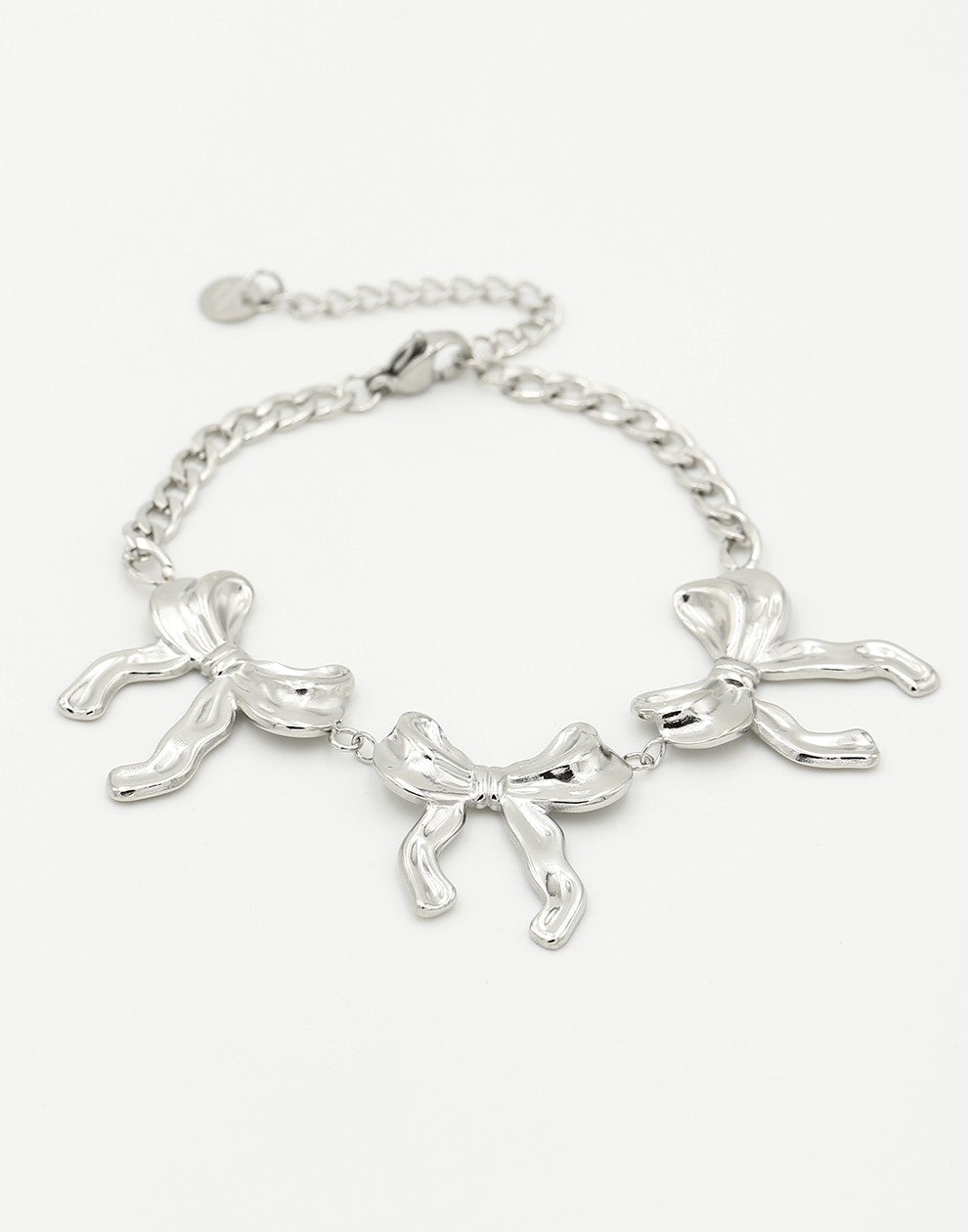 schakelarmband met 3 chunky strikjes zilverkleurig