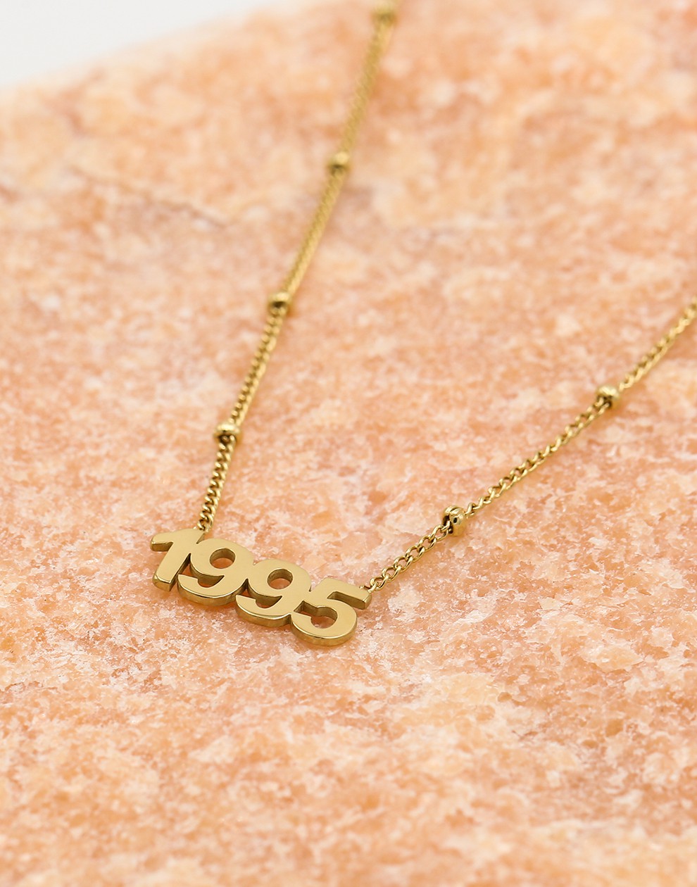 Ketting jaartal 1995 goudkleurig
