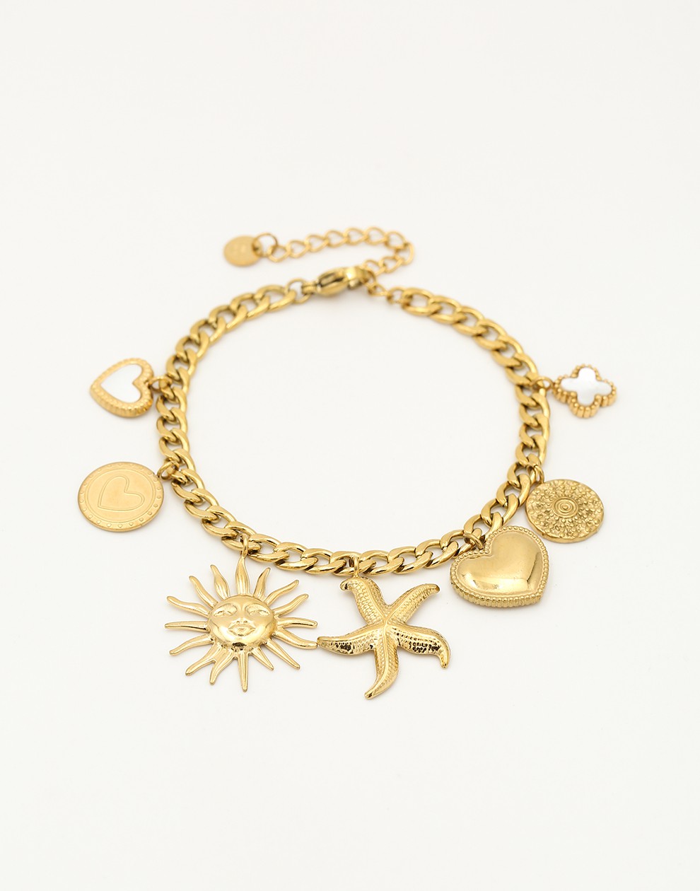 Charm bracelet links with different charms gold-colored