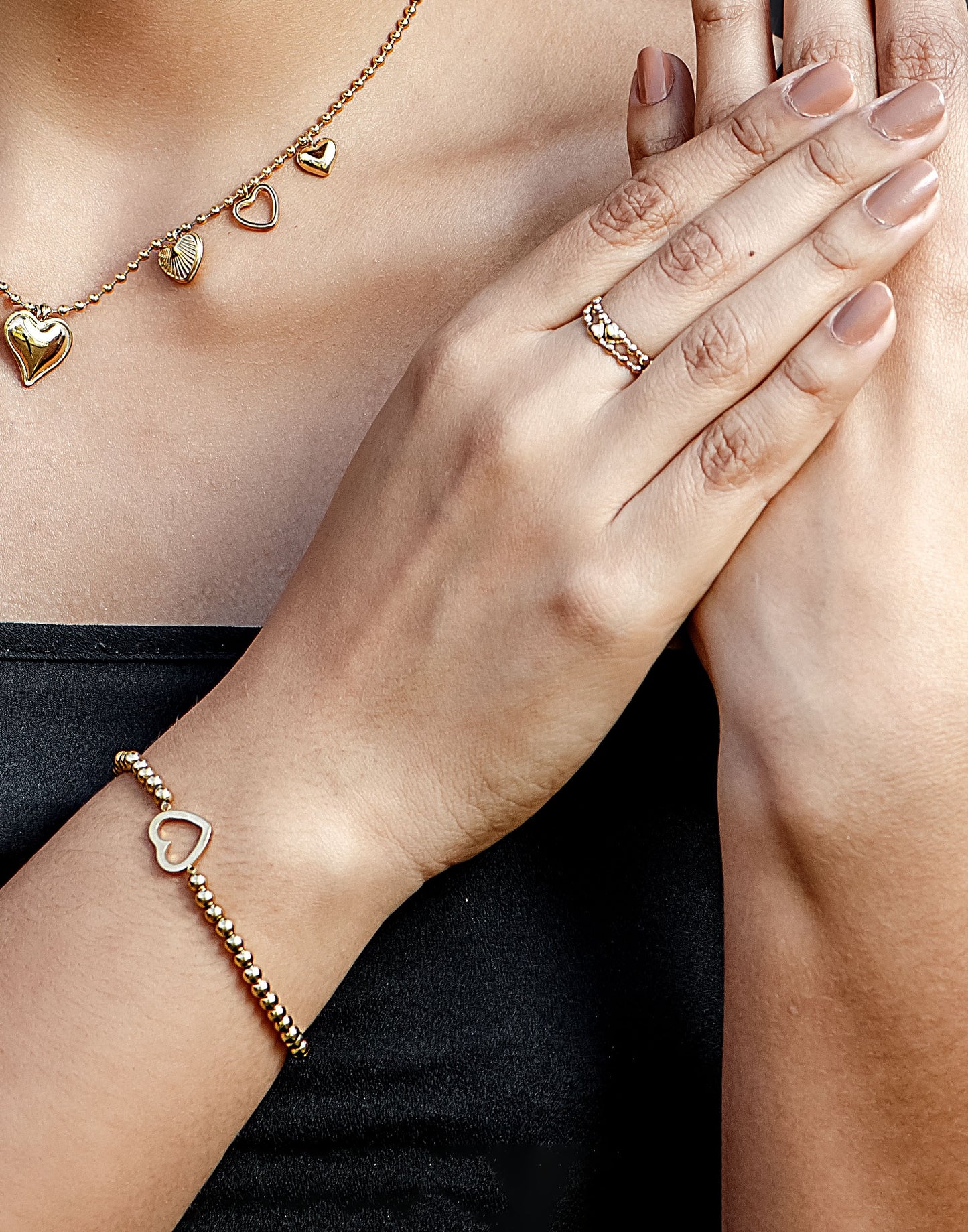 stretch armband open hartje goudkleurig