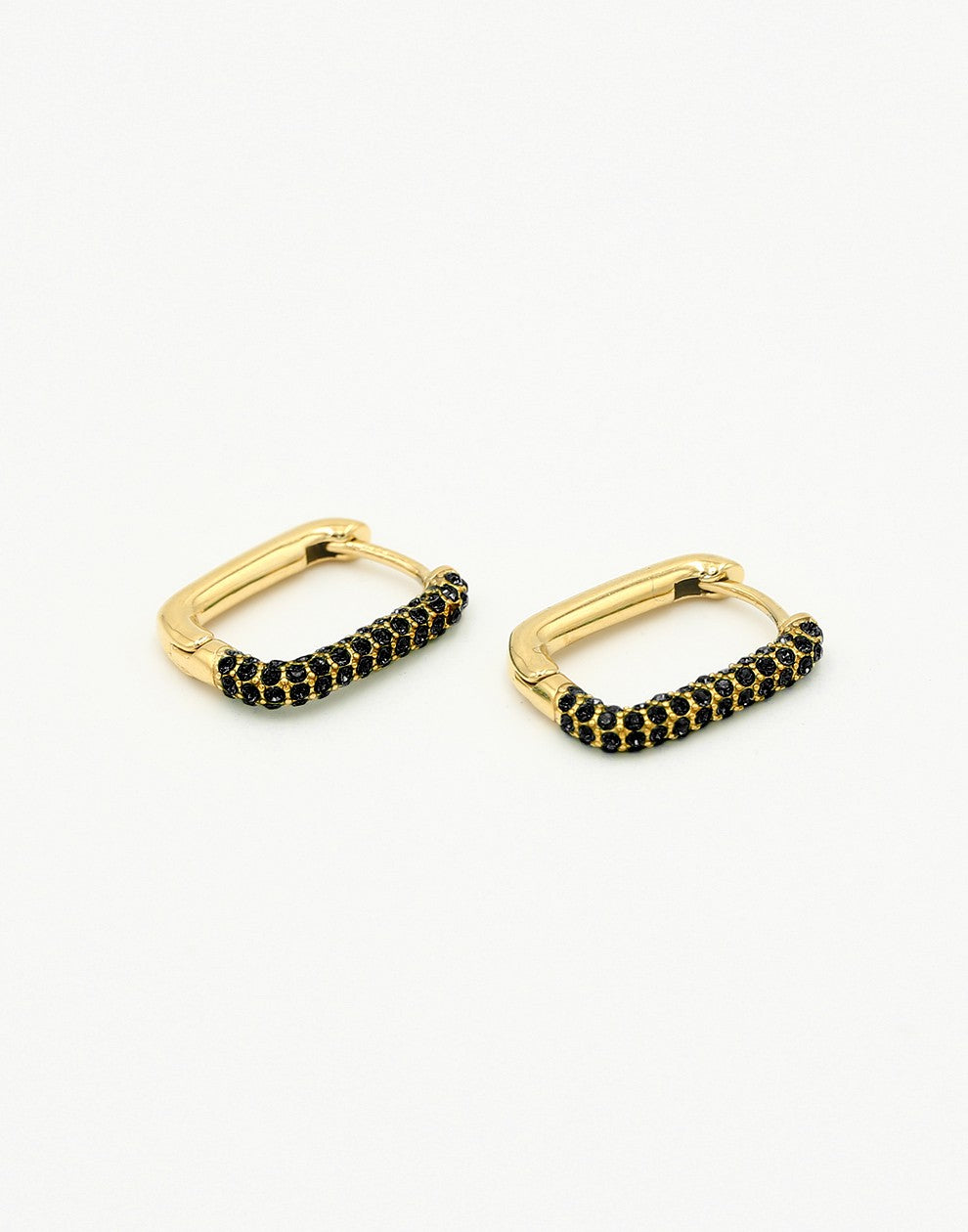 oval earrings with black and gold-colored stones