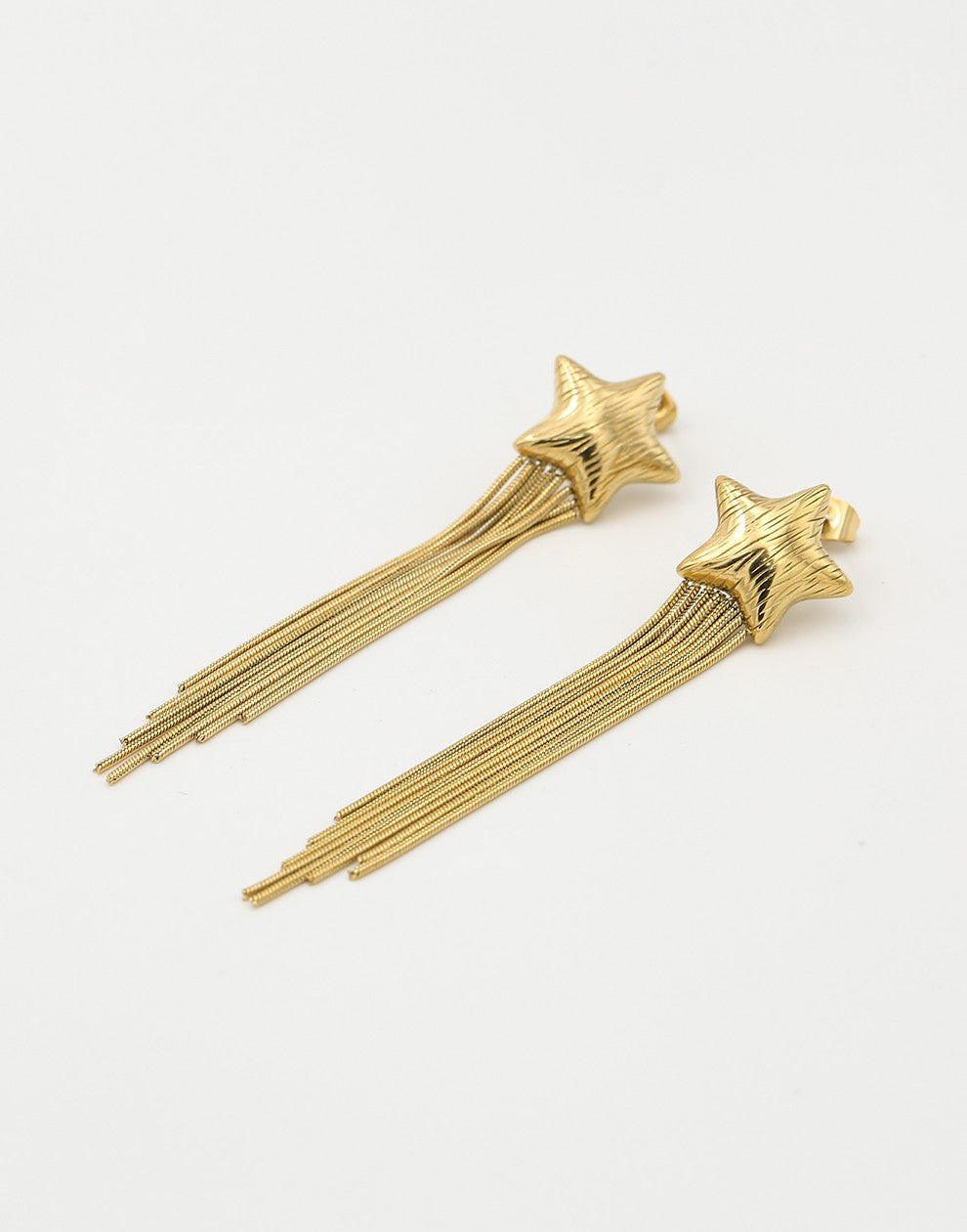 gold-colored star earrings party