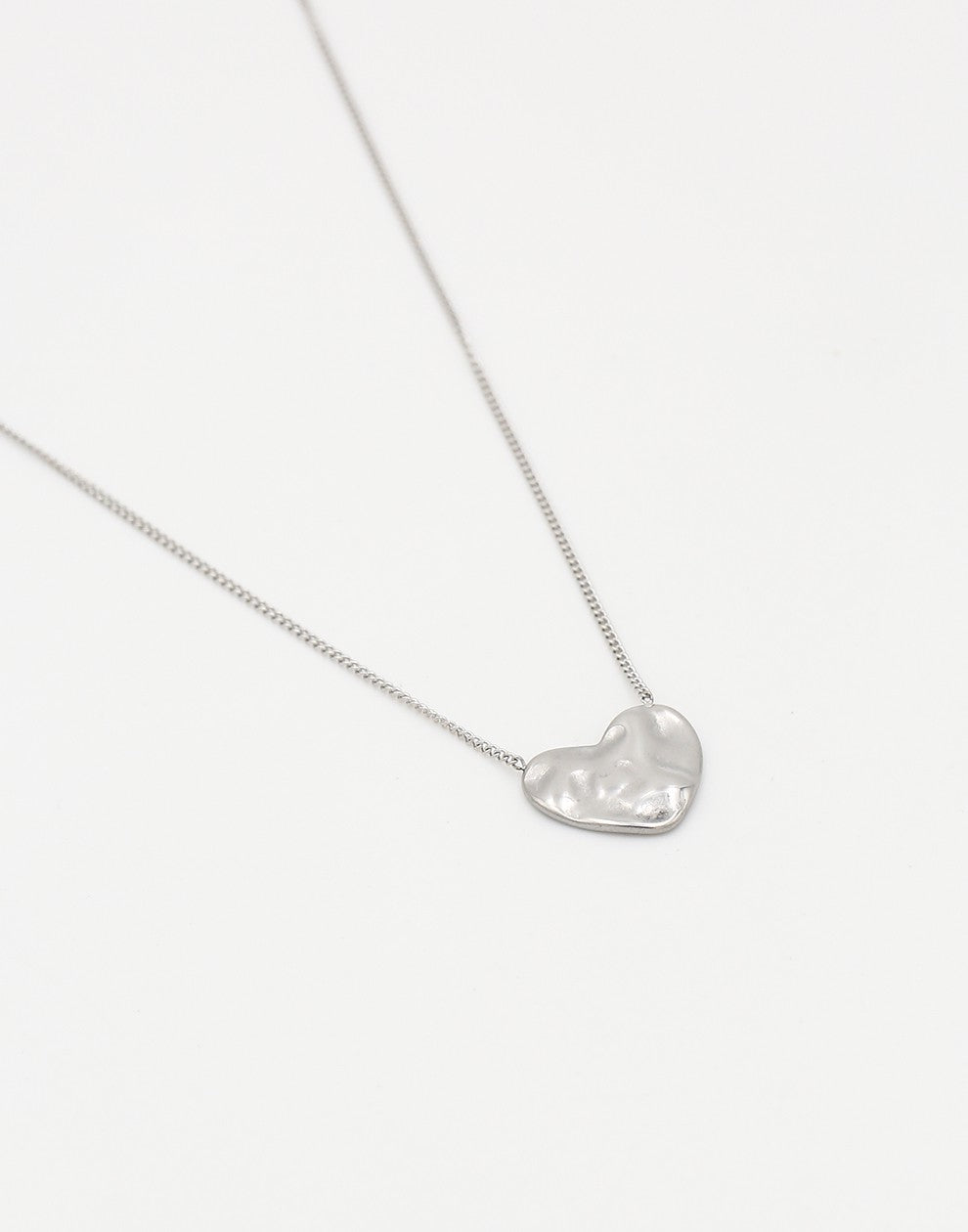 fine necklace with a silver-colored heart