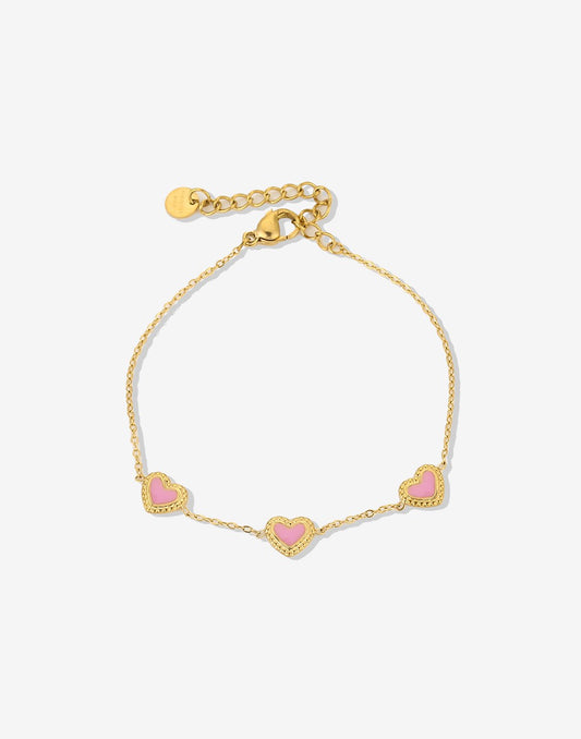 armband drie hartjes roze goudkleurig