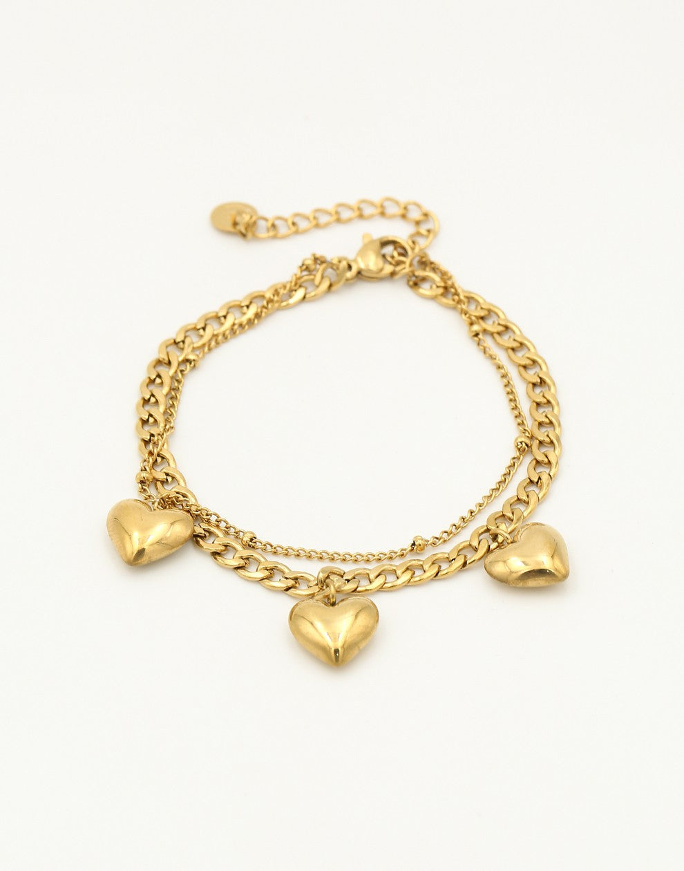 Schakelarmband dubbel met hartjes goudkleurig