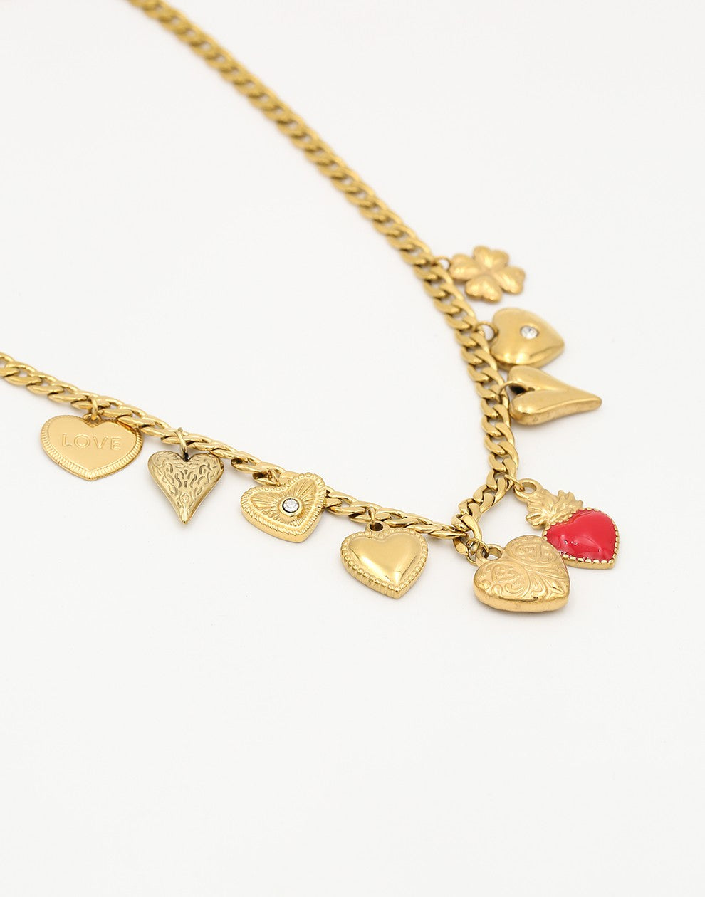 Bedelketting multi hartjes goudkleurig