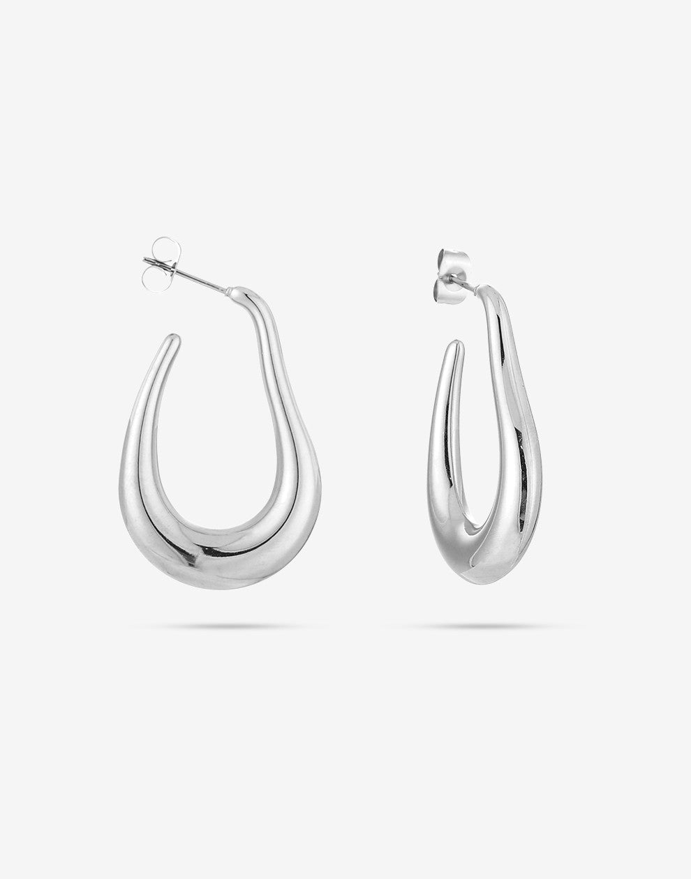 asymmetrical silver-colored earrings
