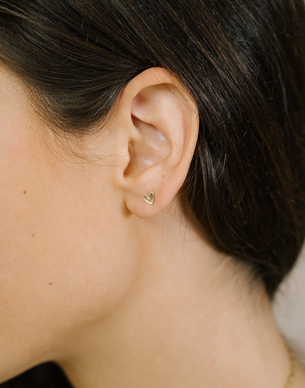 Oorsteker speels hartje goudkleurig