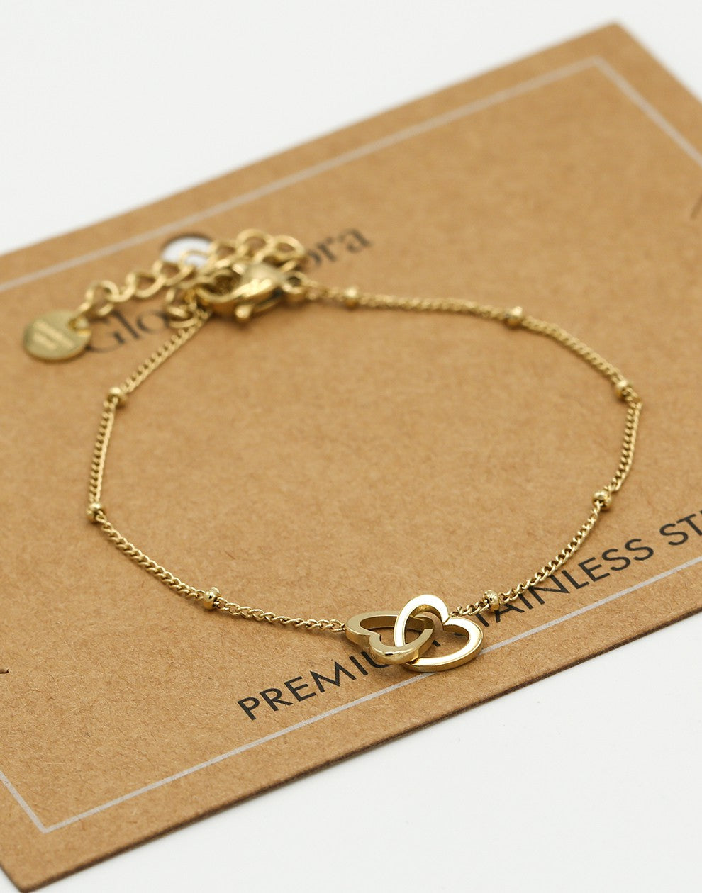Armband met dubbele hartjes goudkleurig