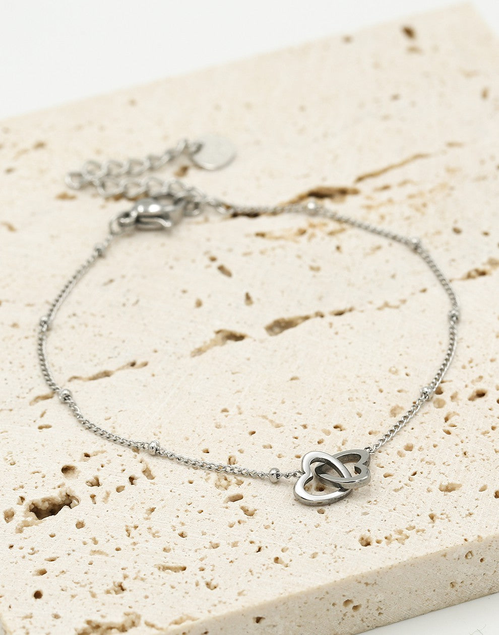 Armband met dubbele hartjes zilverkleurig