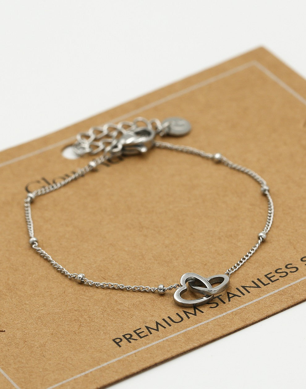 Armband met dubbele hartjes zilverkleurig