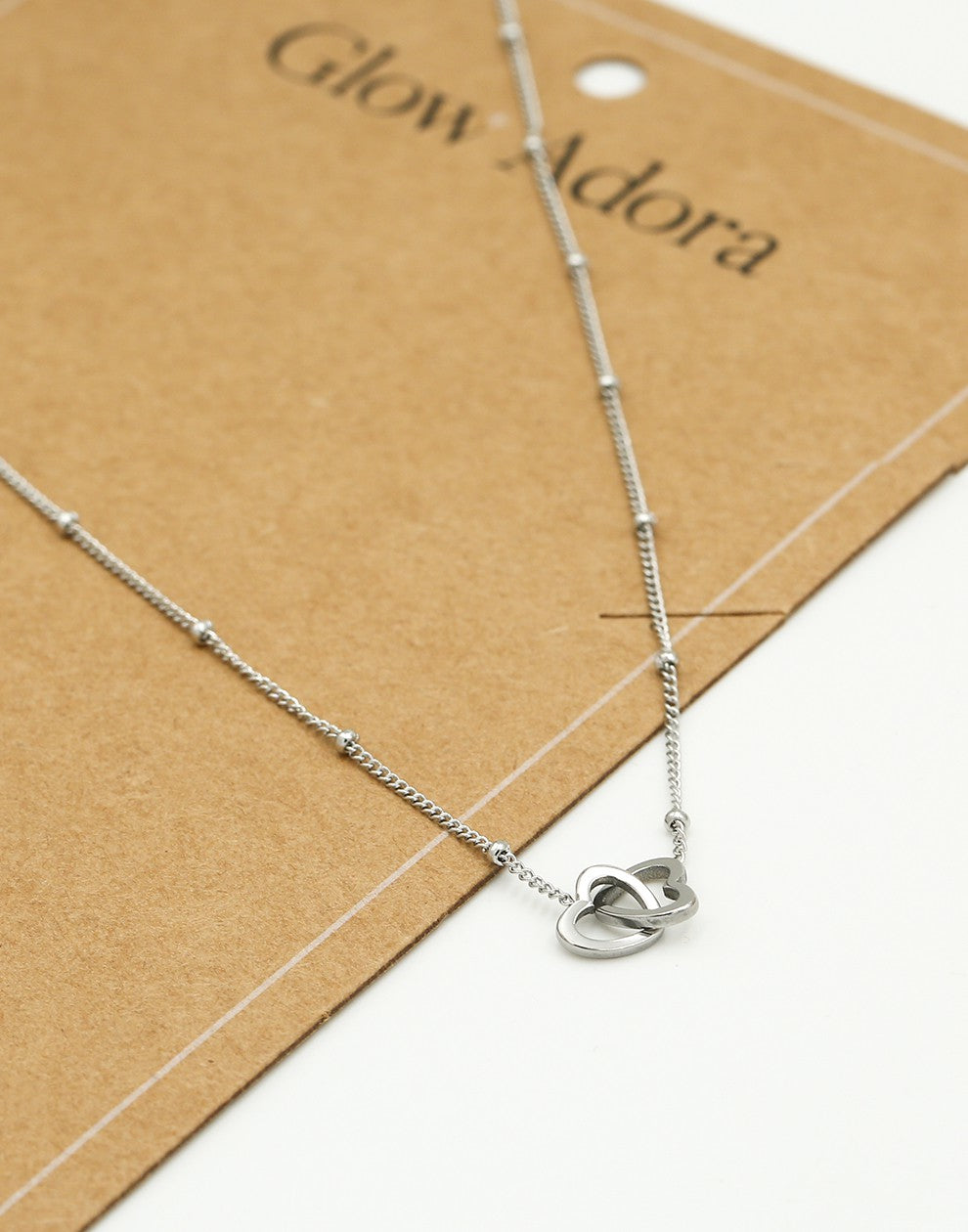 Ketting met dubbele hartjes zilverkleurig