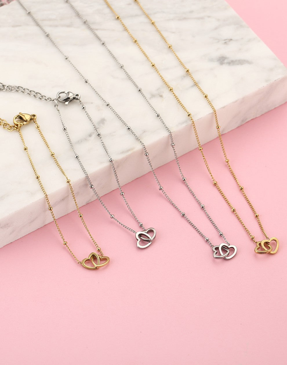 Ketting met dubbele hartjes zilverkleurig