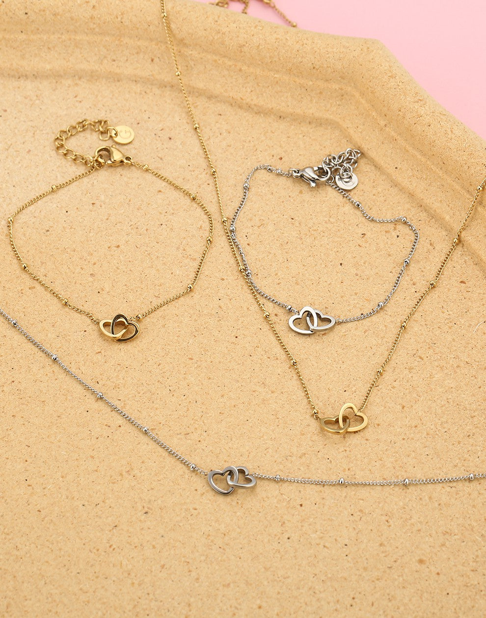Ketting met dubbele hartjes zilverkleurig