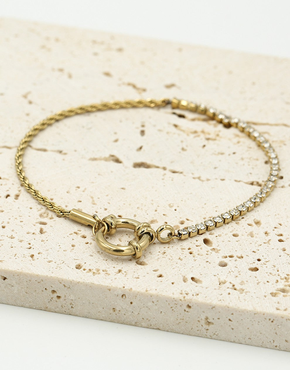 Bracelet twisted link with gold-colored stones