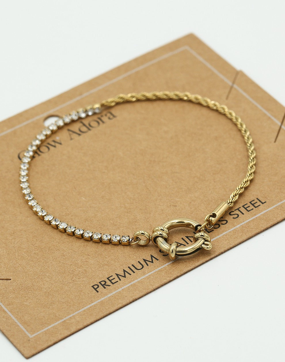 Bracelet twisted link with gold-colored stones