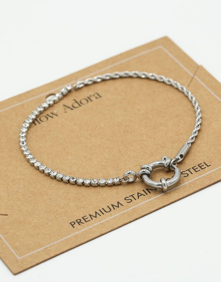 Armband gedraaide schakel met steentjes zilverkleurig