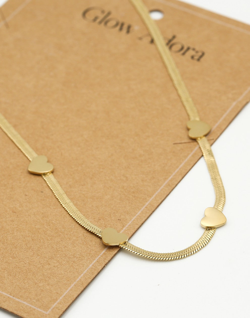 Ketting snake met hartjes goudkleurig