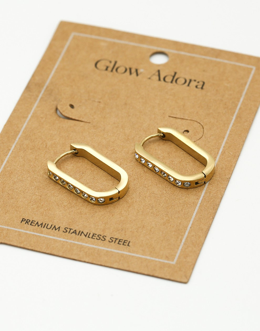 Rectangular earrings with gold-colored stones