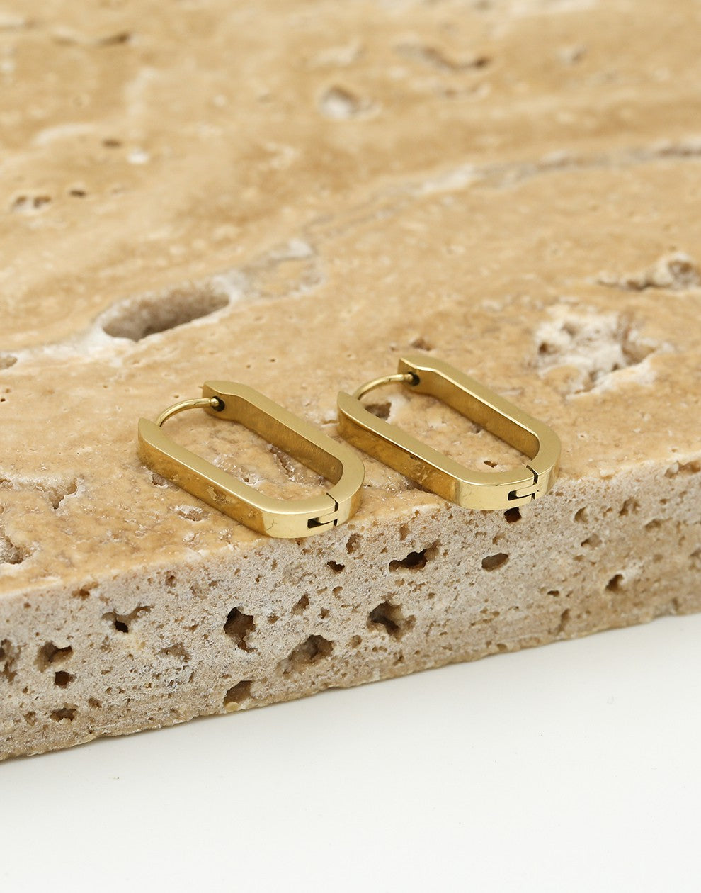 Rectangular gold-colored earring