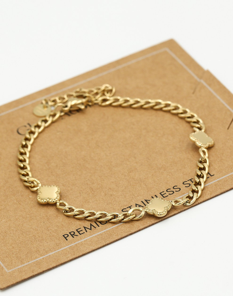 Bracelet with gold-colored clovers
