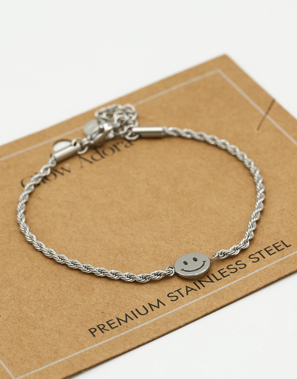 Gedraaide armband smiley zilverkleurig