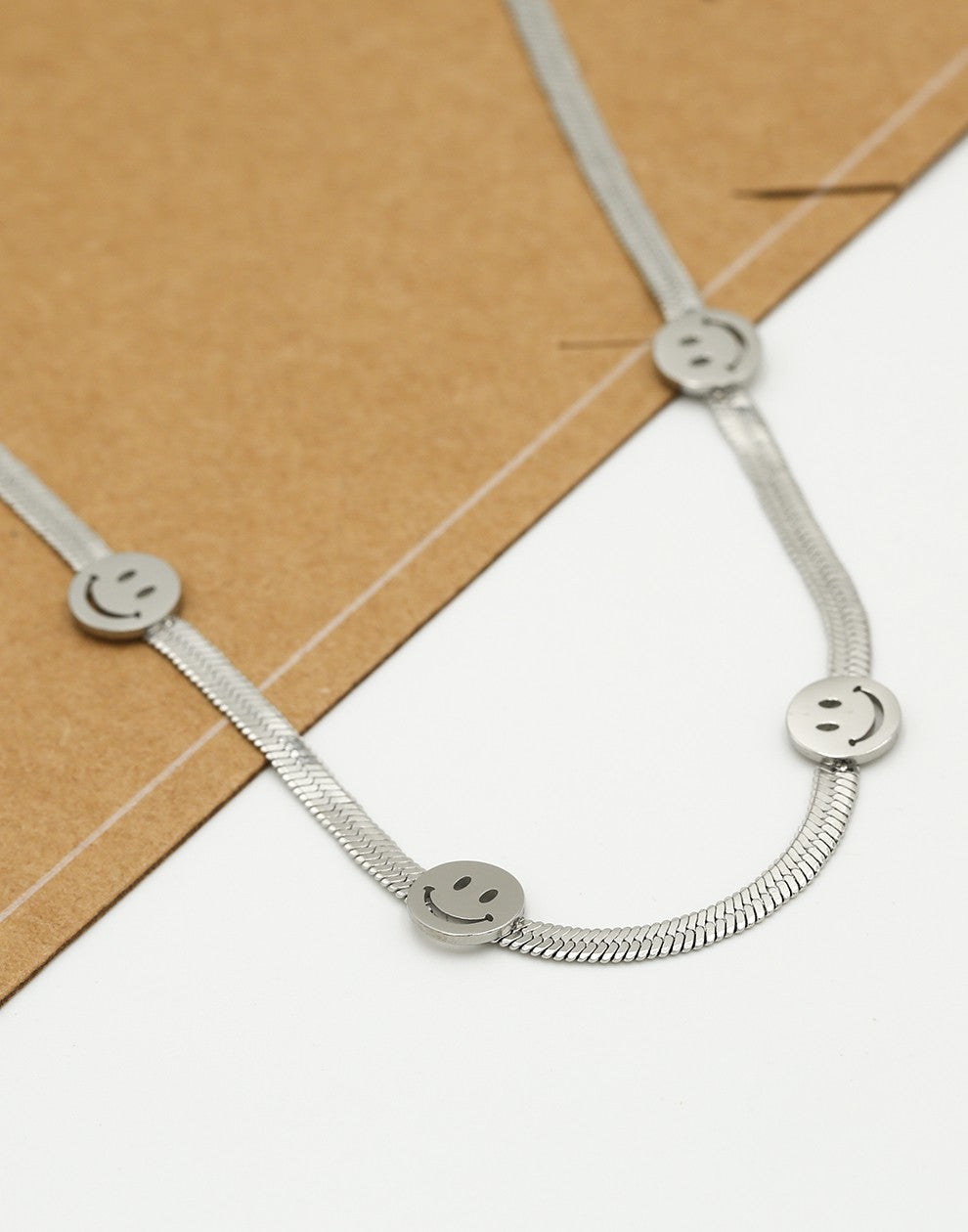 Ketting snake met smileys zilverkleurig