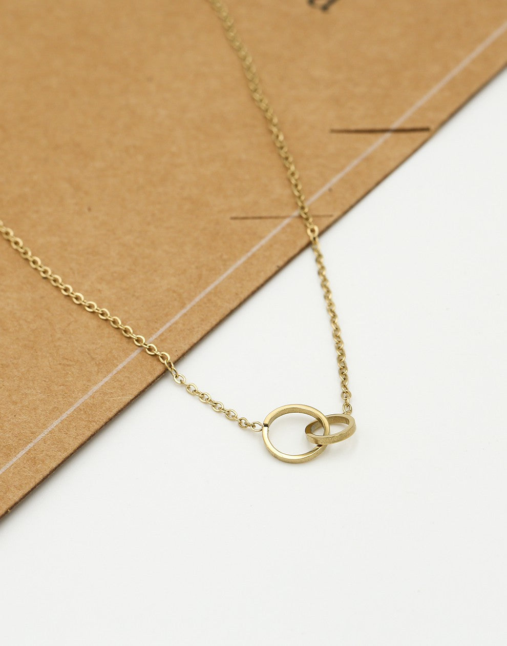 Ketting 2 open rondjes verbonden goudkleurig
