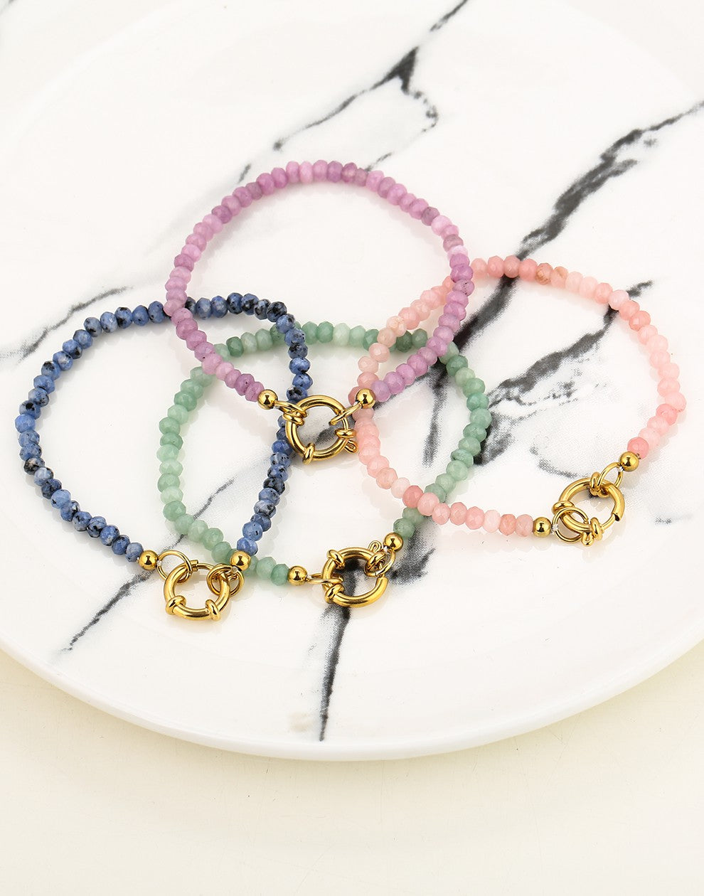 Kralenarmband met slotje paars