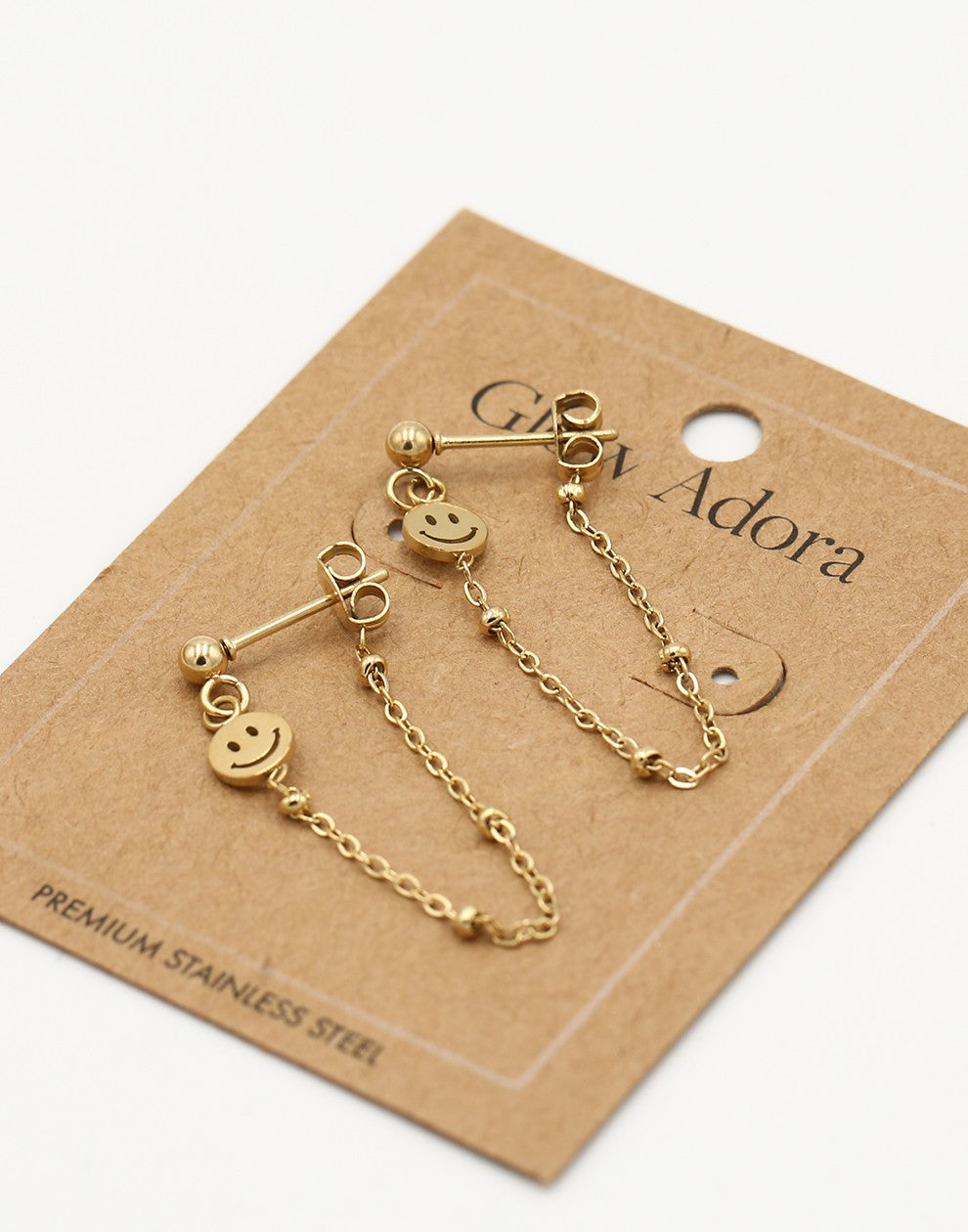 Oorsteker smiley chain goudkleurig