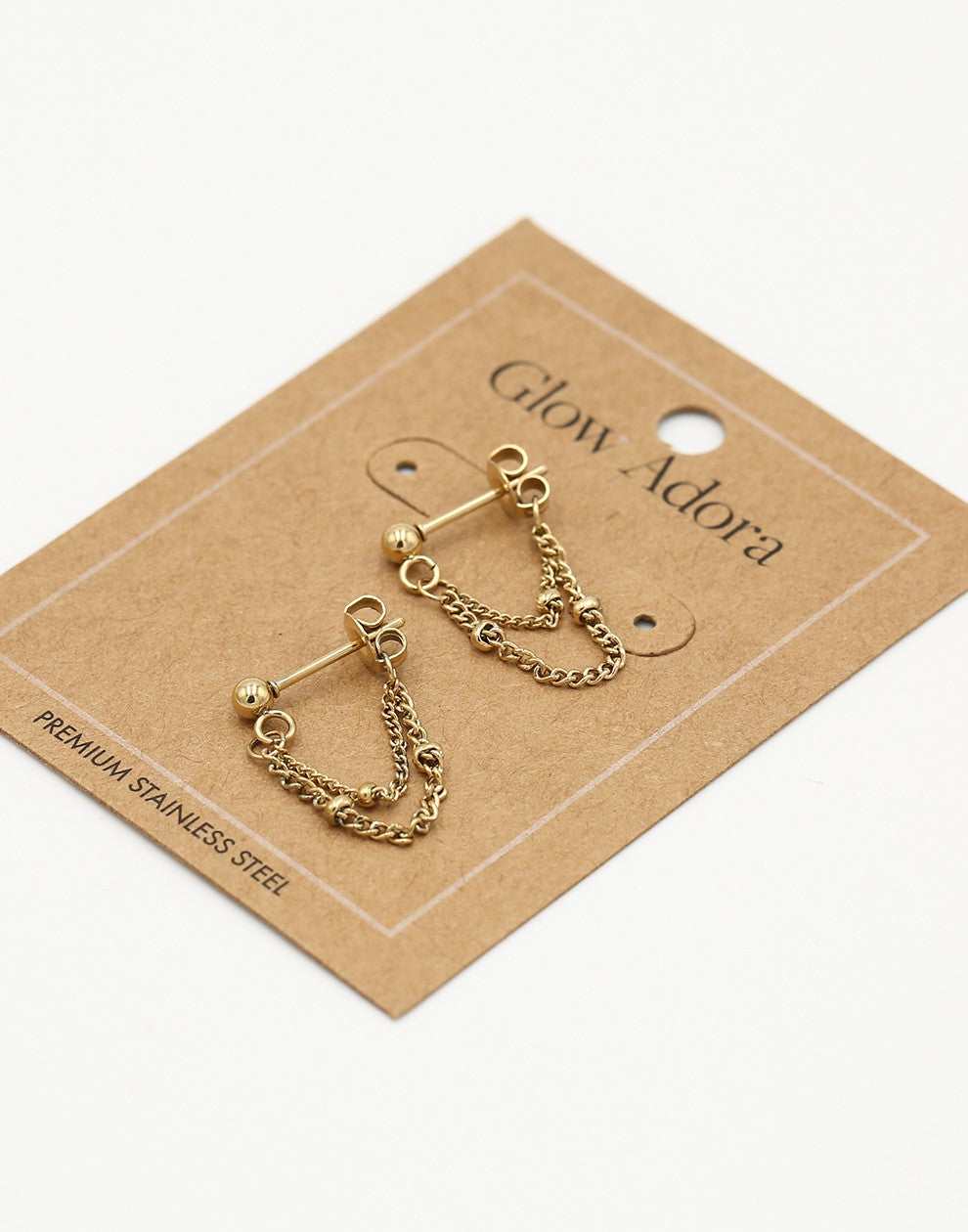 Oorsteker ketting bolletje goudkleurig