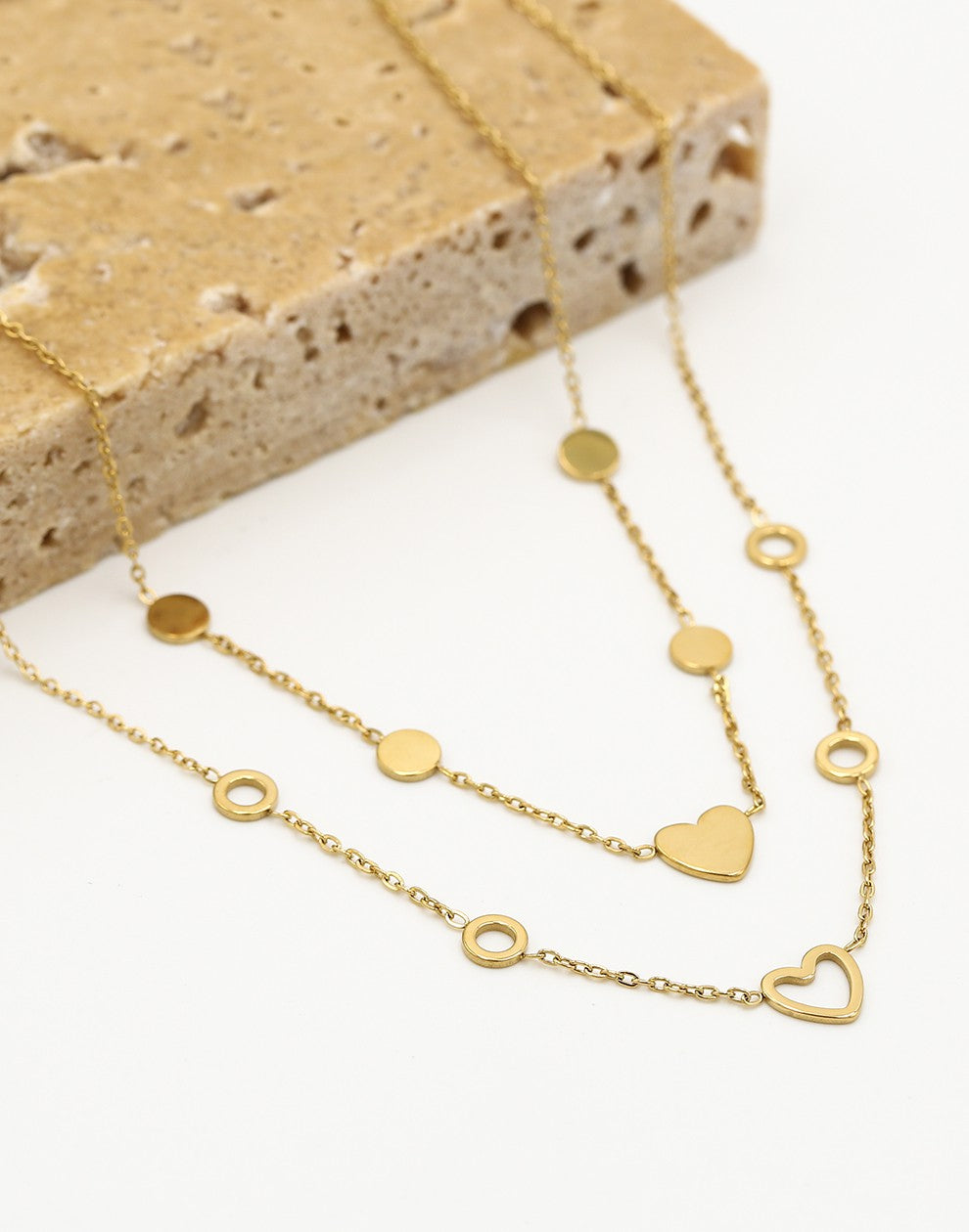 Vriendschaps kettingen hartjes met cirkels goudkleurig