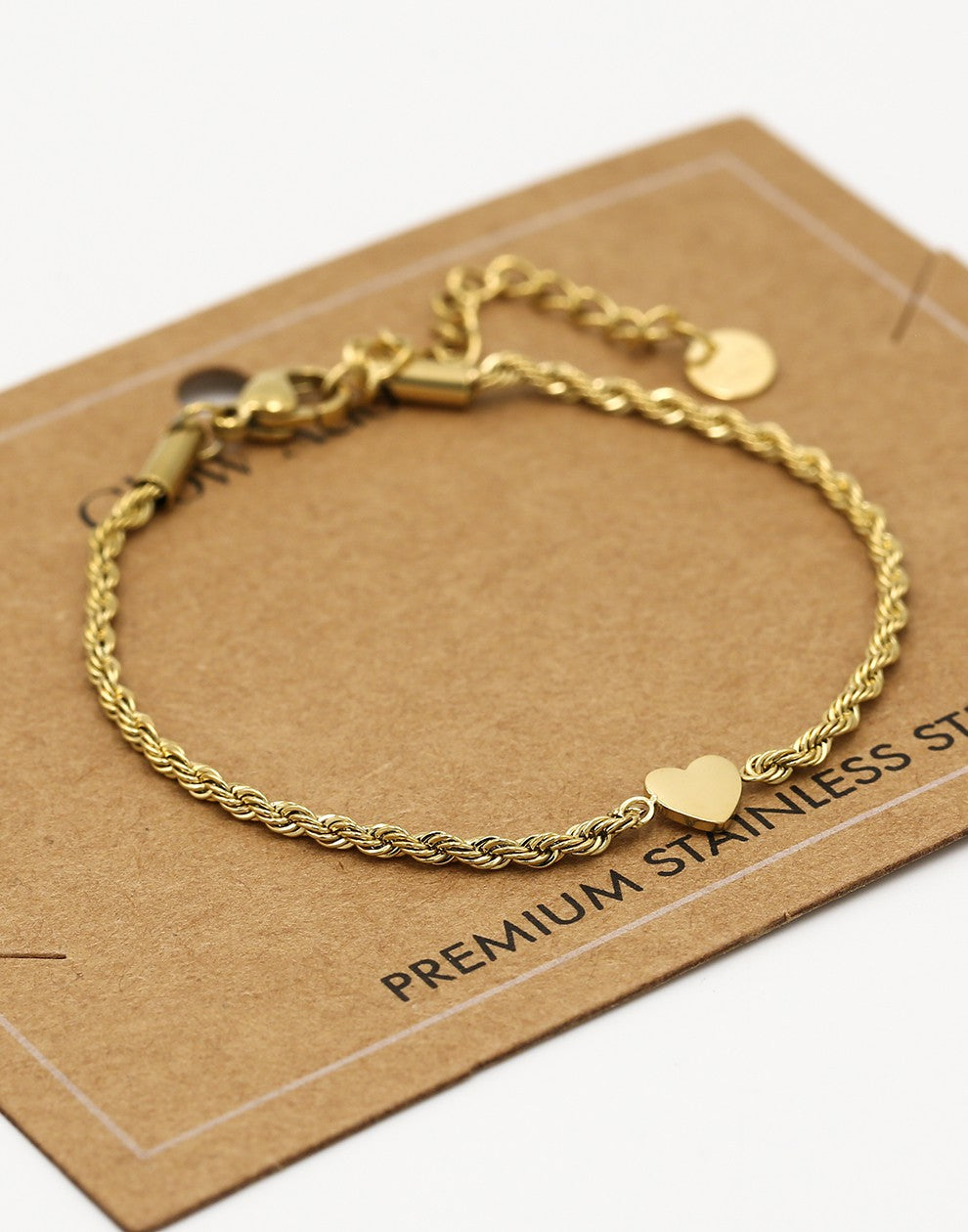 Armband gedraaid met hartje goudkleurig