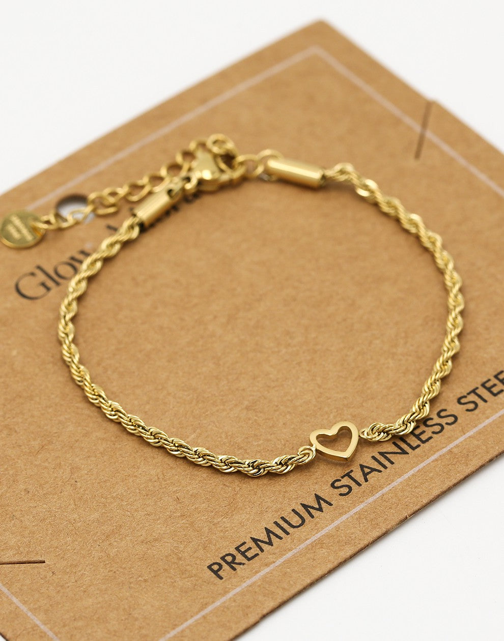 Armband gedraaid met open hartje goudkleurig