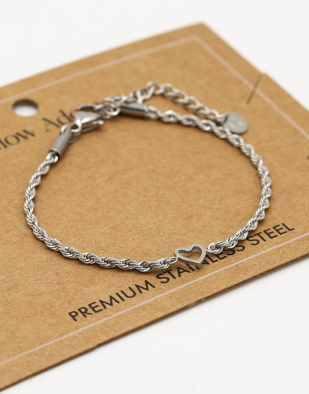 Armband gedraaid met open hartje zilverkleurig