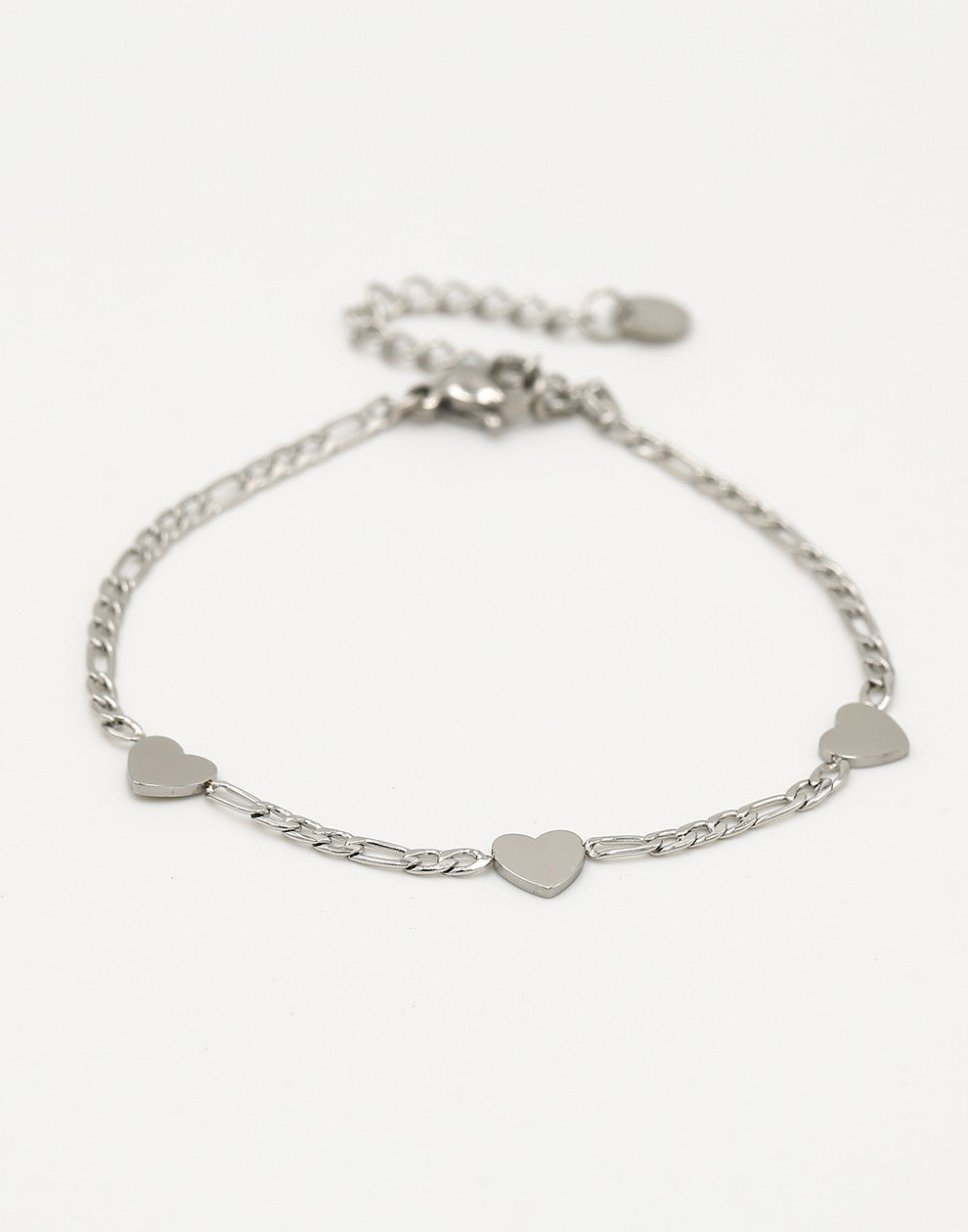 Schakelarmband drie hartjes zilverkleurig