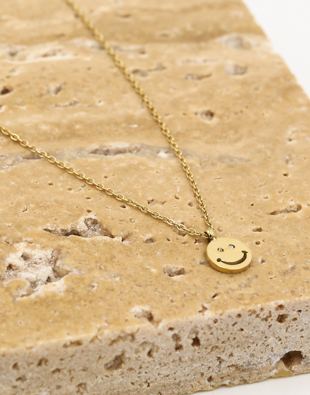 ketting smiley hanger goudkleurig