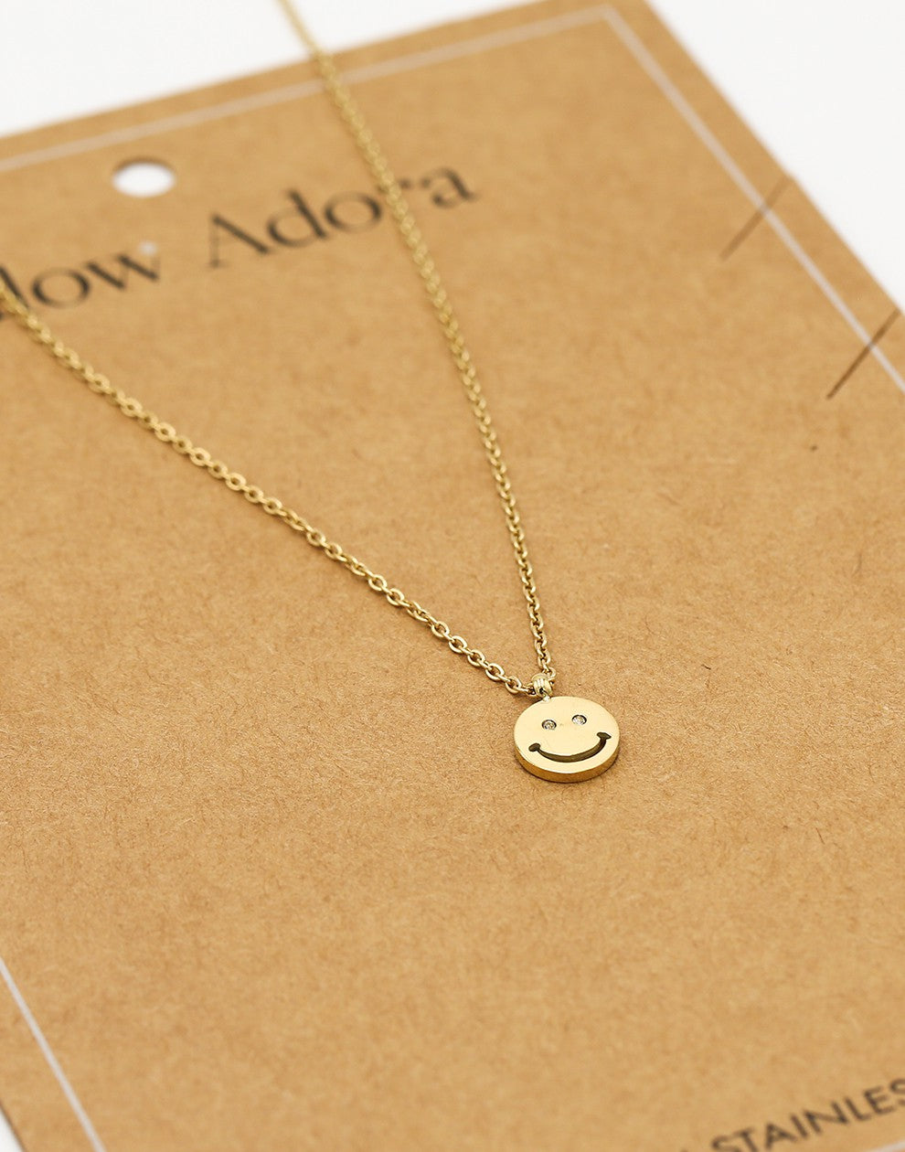 ketting smiley hanger goudkleurig