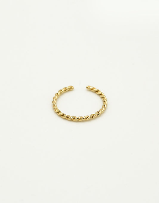 Twisted gold-colored ring