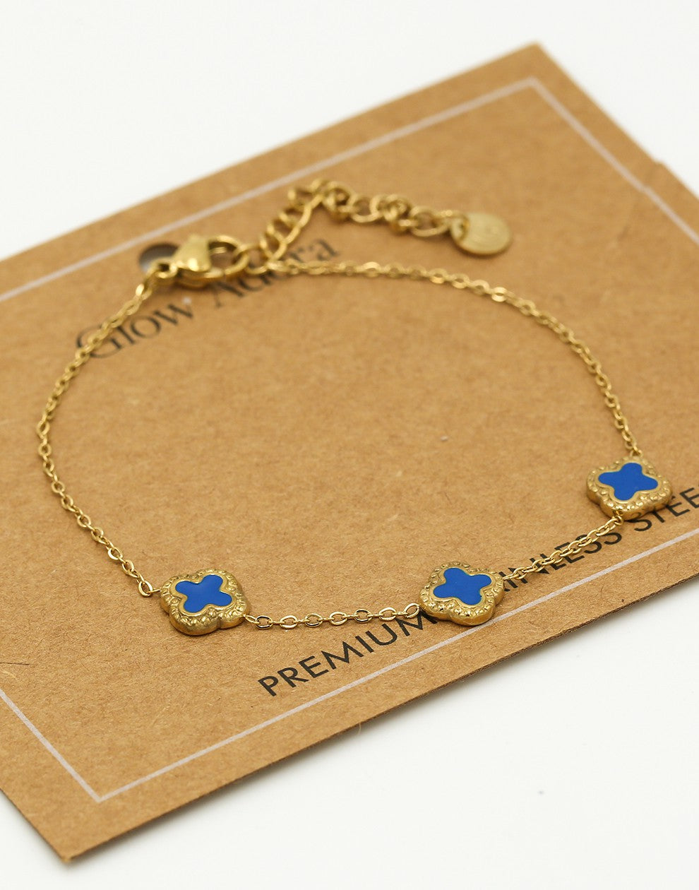 Armband klavers blauw goudkleurig