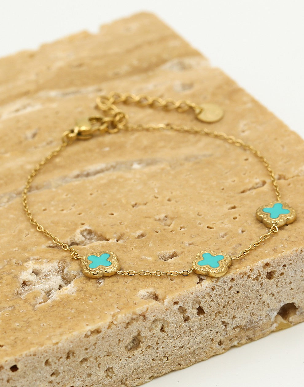 Armband klavers turquoise goudkleurig