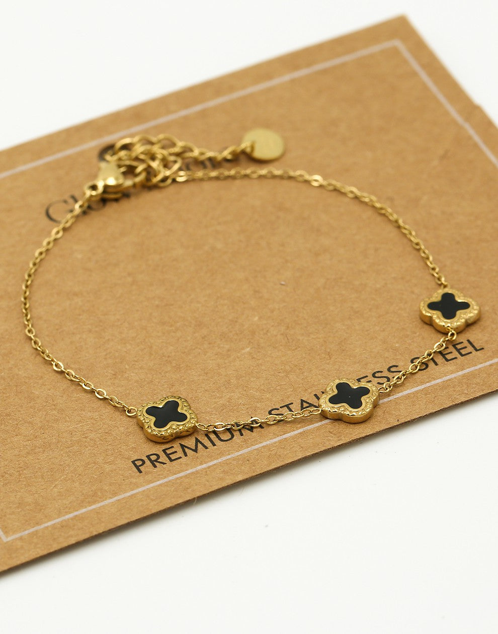 Armband klavers zwart goudkleurig