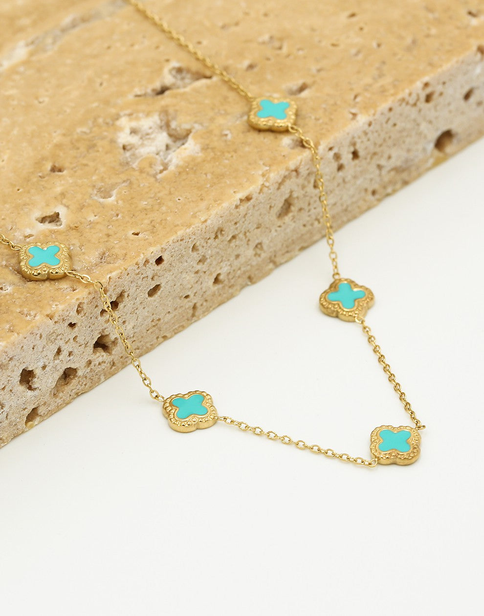 Ketting klavers turquoise goudkleurig