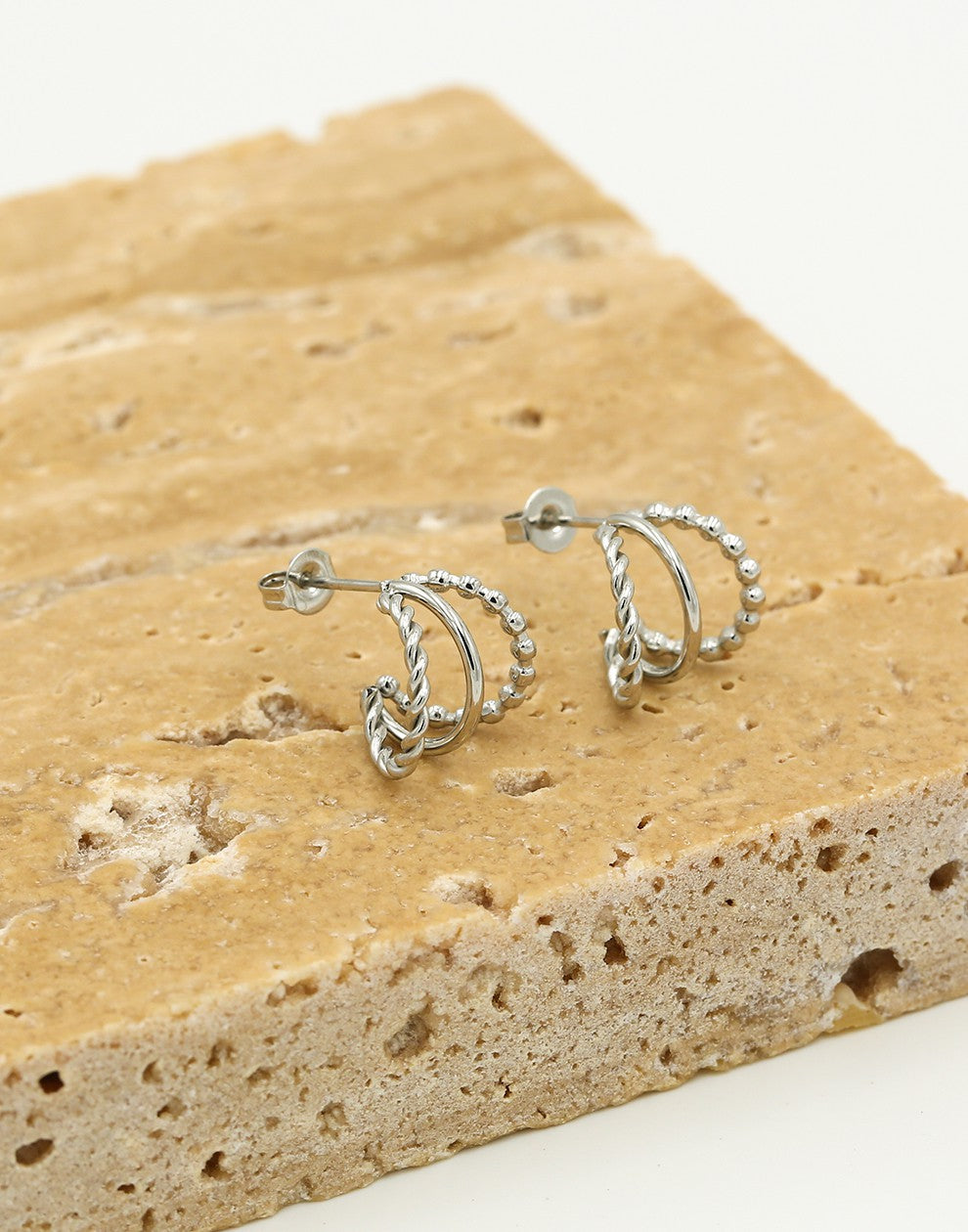 Triple silver-colored earrings
