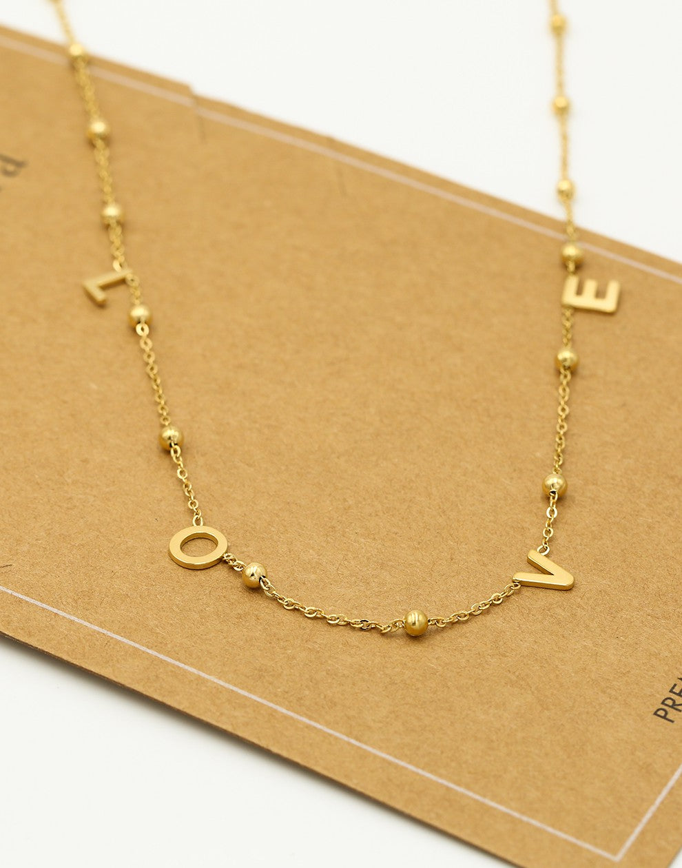 Ketting love bolletjes goudkleurig