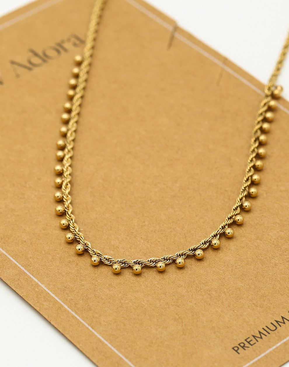 Gedraaide ketting bolletjes goudkleurig
